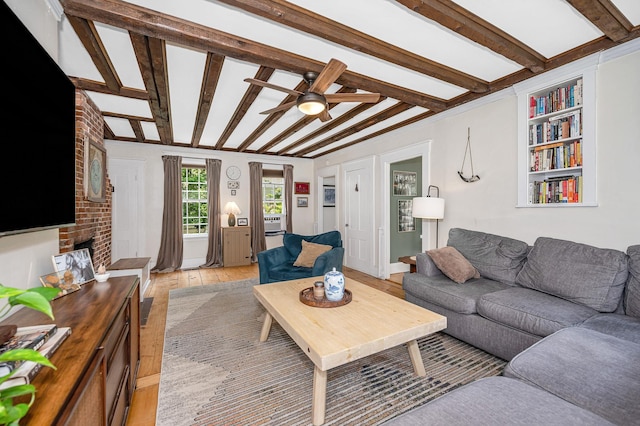 8 Main St, Brookline, NH 03033 - living area with a ceiling fan, light wood-style floors, and beamed ceiling