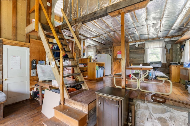 4121 Canaan Hill Rd, Canaan, VT 05903 - basement featuring hardwood / wood-style floors, freestanding refrigerator, and wooden walls