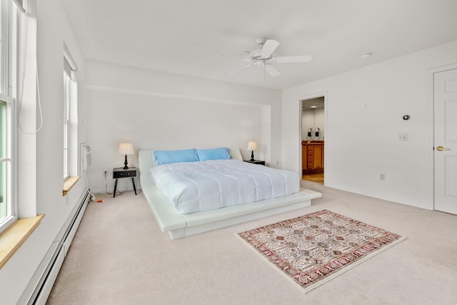 7 Shadow Brook Dr, Hanover, NH 03755 - carpeted bedroom with baseboard heating, ceiling fan, and ensuite bath