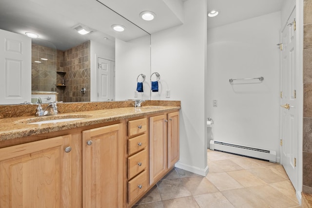 7 Shadow Brook Dr, Hanover, NH 03755 - full bath featuring a baseboard radiator, double vanity, tiled shower, and tile patterned floors