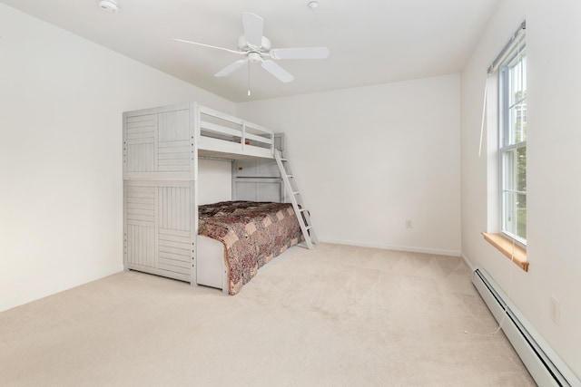 7 Shadow Brook Dr, Hanover, NH 03755 - unfurnished bedroom featuring a baseboard radiator, carpet floors, and a ceiling fan