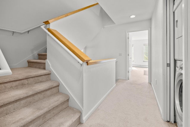 7 Shadow Brook Dr, Hanover, NH 03755 - stairs with stacked washing machine and dryer and carpet flooring