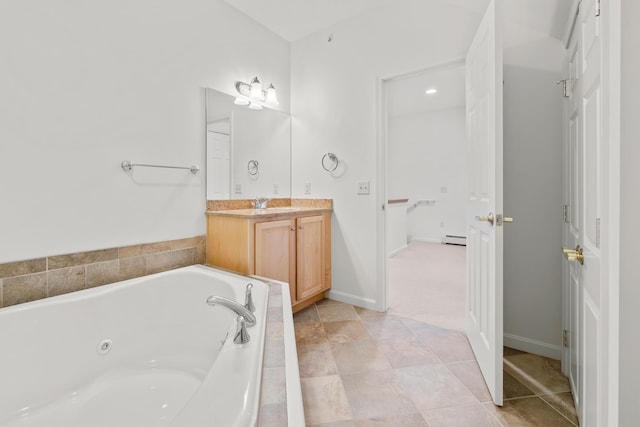 7 Shadow Brook Dr, Hanover, NH 03755 - bathroom with vanity, a whirlpool tub, and a baseboard heating unit