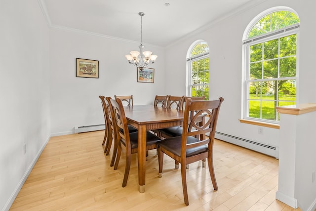7 Shadow Brook Dr, Hanover, NH 03755 - dining space featuring a baseboard radiator, ornamental molding, light wood-type flooring, and a chandelier