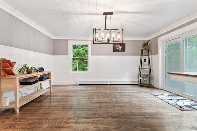6 Rainbow Dr, Ossipee, NH 03864 - unfurnished dining area with a chandelier, crown molding, a wainscoted wall, and wood finished floors