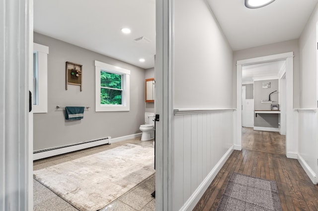 6 Rainbow Dr, Ossipee, NH 03864 - hallway featuring a baseboard heating unit, hardwood / wood-style floors, recessed lighting, and wainscoting