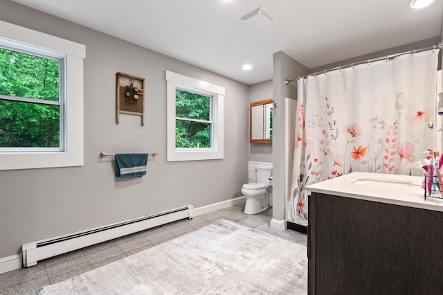 6 Rainbow Dr, Ossipee, NH 03864 - bathroom with a baseboard heating unit, healthy amount of natural light, recessed lighting, vanity, and a shower with curtain