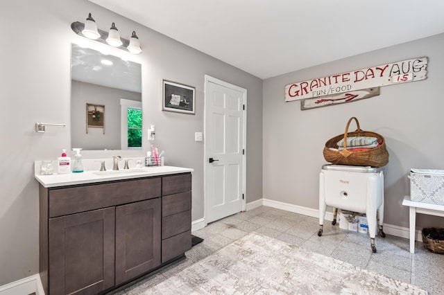 6 Rainbow Dr, Ossipee, NH 03864 - bathroom featuring granite tiled floors and vanity