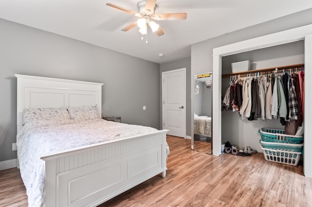 6 Rainbow Dr, Ossipee, NH 03864 - bedroom featuring a closet, light wood-style flooring, and a ceiling fan