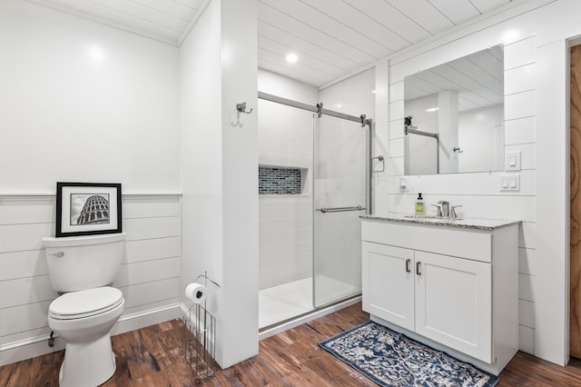 6 Rainbow Dr, Ossipee, NH 03864 - bathroom featuring vanity, a stall shower, wood finished floors, and recessed lighting