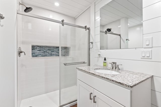 6 Rainbow Dr, Ossipee, NH 03864 - full bath with a stall shower, vanity, and recessed lighting