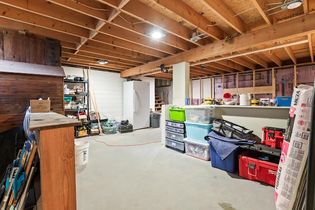 6 Rainbow Dr, Ossipee, NH 03864 - unfinished basement featuring freestanding refrigerator and stairs