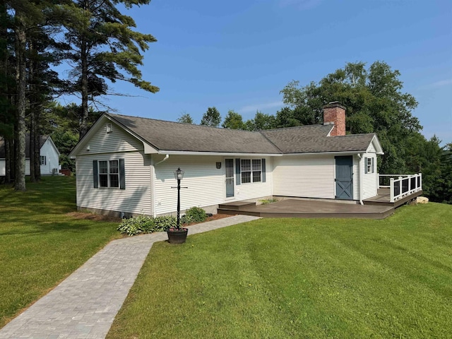 653 Skyboro E Rd, Pownal, VT 05261 - view of front of home with a chimney, a front lawn, a deck, and roof with shingles