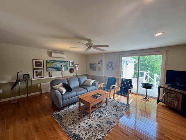 653 Skyboro E Rd, Pownal, VT 05261 - living area with a wall mounted air conditioner, hardwood / wood-style flooring, ceiling fan, and recessed lighting