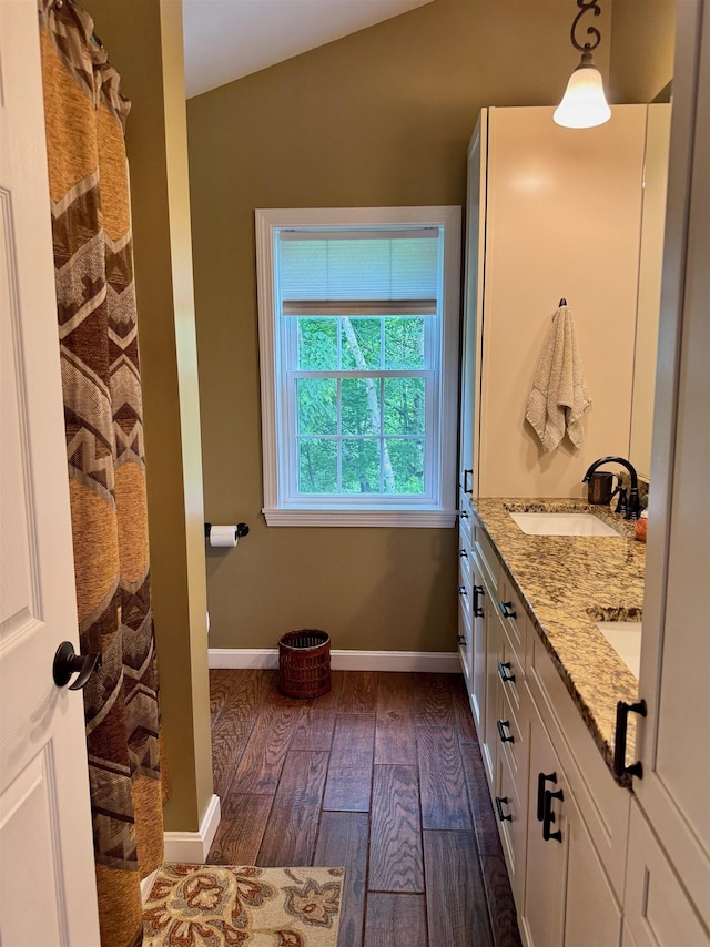 653 Skyboro E Rd, Pownal, VT 05261 - bathroom featuring wood finished floors and double vanity