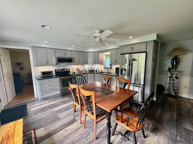 653 Skyboro E Rd, Pownal, VT 05261 - dining room with wood finished floors, a ceiling fan, and recessed lighting