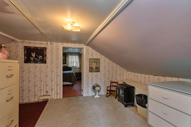 3123 Carter Hill Rd, Highgate, VT 05488 - office with wallpapered walls, lofted ceiling, a wood stove, and light colored carpet