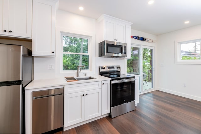 427 Weirs Blvd Unit 3, Laconia, NH 03246 - kitchen featuring appliances with stainless steel finishes, light countertops, plenty of natural light, and recessed lighting