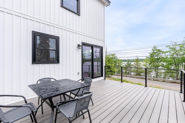 427 Weirs Blvd Unit 3, Laconia, NH 03246 - wooden terrace with outdoor dining space