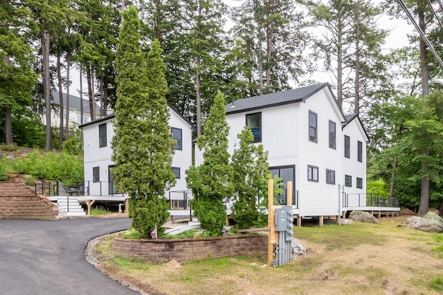 427 Weirs Blvd Unit 3, Laconia, NH 03246 - view of front of home featuring stairs and a shingled roof