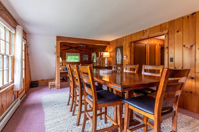 7271 Windham Hill Rd, Windham, VT 05359 - dining space with a baseboard radiator, wooden walls, and carpet floors