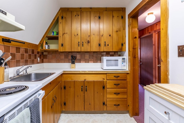 7271 Windham Hill Rd, Windham, VT 05359 - kitchen with white microwave, under cabinet range hood, light countertops, open shelves, and backsplash