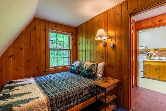 7271 Windham Hill Rd, Windham, VT 05359 - carpeted bedroom with wood walls, vaulted ceiling, and connected bathroom