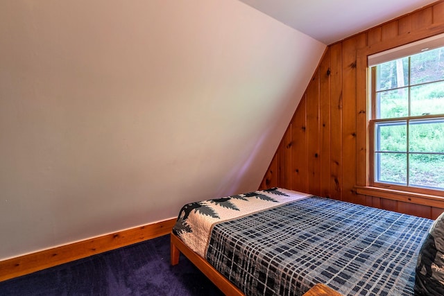7271 Windham Hill Rd, Windham, VT 05359 - carpeted bedroom featuring wooden walls and vaulted ceiling
