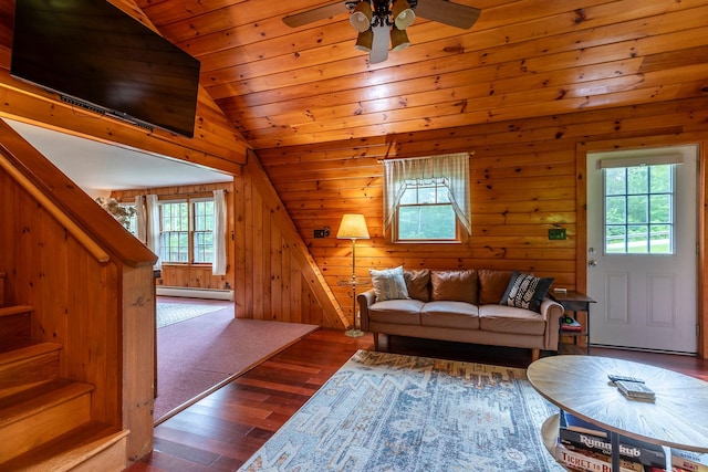7271 Windham Hill Rd, Windham, VT 05359 - living area with a baseboard heating unit, vaulted ceiling, hardwood / wood-style flooring, wood walls, and a ceiling fan