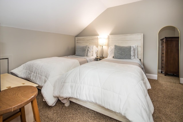 267 Village Cir Unit V-15, Killington, VT 05751 - carpeted bedroom with lofted ceiling and baseboards