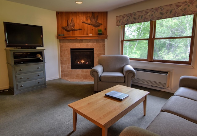 164 Deer Park Dr Unit 173A, Woodstock, NH 03262 - living room with a wall unit AC, a tile fireplace, carpet, and recessed lighting