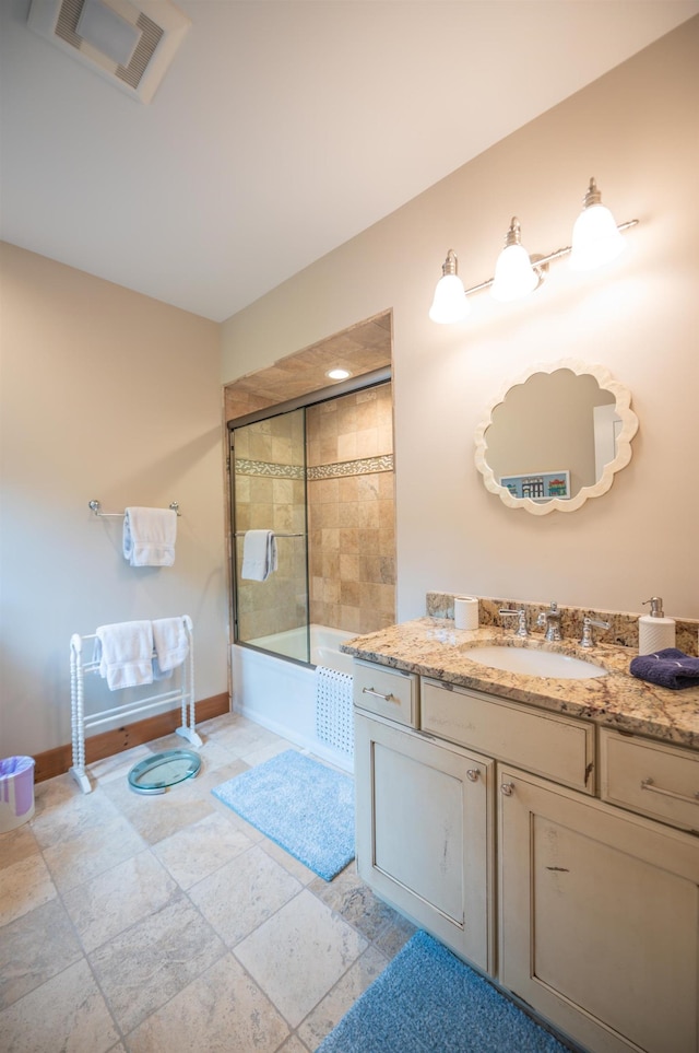 56 Coldbrook Xing, Wilmington, VT 05363 - full bathroom with vanity, bathing tub / shower combination, and stone tile floors