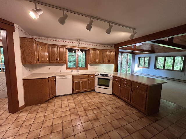 12 Juniper Ridge Rd, Exeter, NH 03833 - kitchen featuring white appliances, track lighting, a peninsula, brown cabinetry, and light countertops