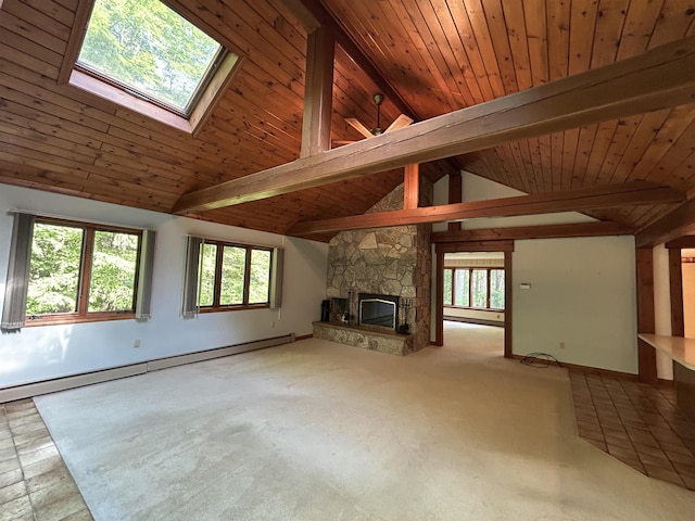12 Juniper Ridge Rd, Exeter, NH 03833 - unfurnished living room with a baseboard heating unit, a fireplace, wood ceiling, and plenty of natural light