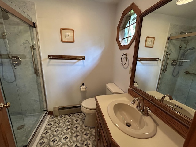 12 Juniper Ridge Rd, Exeter, NH 03833 - bathroom featuring baseboard heating, a shower stall, vanity, and tile patterned floors