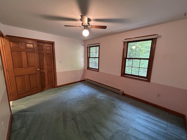 12 Juniper Ridge Rd, Exeter, NH 03833 - unfurnished bedroom with a baseboard heating unit, carpet floors, ceiling fan, and a closet