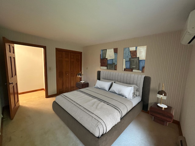 12 Juniper Ridge Rd, Exeter, NH 03833 - bedroom with a closet, a wall unit AC, and carpet floors