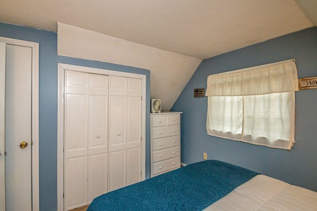 435 Rolling Ridge Rd, Bartlett, NH 03812 - bedroom with lofted ceiling and a closet