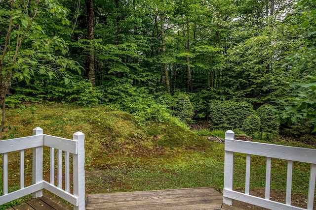 435 Rolling Ridge Rd, Bartlett, NH 03812 - view of yard with a forest view and a wooden deck