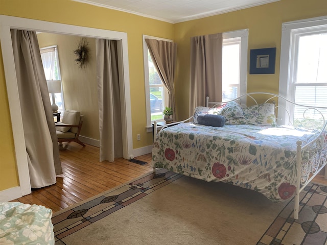 7-9 Elm St, Waterbury, VT 05676 - bedroom featuring hardwood / wood-style floors and ornamental molding