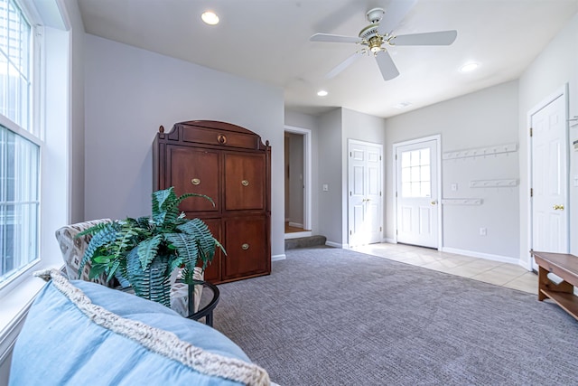48 Cider Mill Rd, Bedford, NH 03110 - bedroom with recessed lighting, light tile patterned floors, a ceiling fan, and light carpet