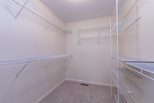 48 Cider Mill Rd, Bedford, NH 03110 - walk in closet featuring carpet floors