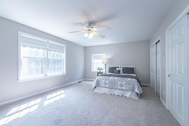 48 Cider Mill Rd, Bedford, NH 03110 - carpeted bedroom featuring baseboards and a ceiling fan