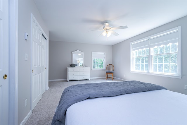 48 Cider Mill Rd, Bedford, NH 03110 - carpeted bedroom featuring a ceiling fan and a closet