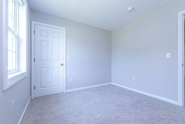 48 Cider Mill Rd, Bedford, NH 03110 - carpeted empty room featuring baseboards and a smoke detector