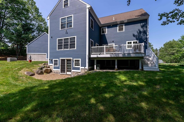 48 Cider Mill Rd, Bedford, NH 03110 - rear view of property featuring a deck, a lawn, and stairs