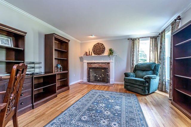 48 Cider Mill Rd, Bedford, NH 03110 - sitting room featuring wood finished floors, a brick fireplace, crown molding, and an office area