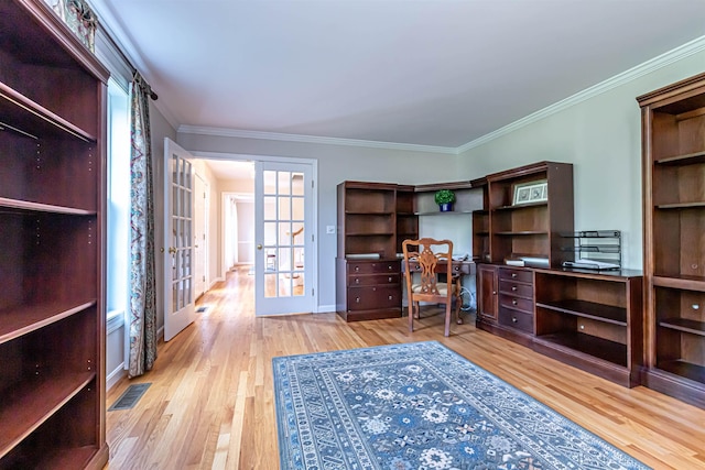 48 Cider Mill Rd, Bedford, NH 03110 - office area with french doors, wood finished floors, crown molding, and plenty of natural light