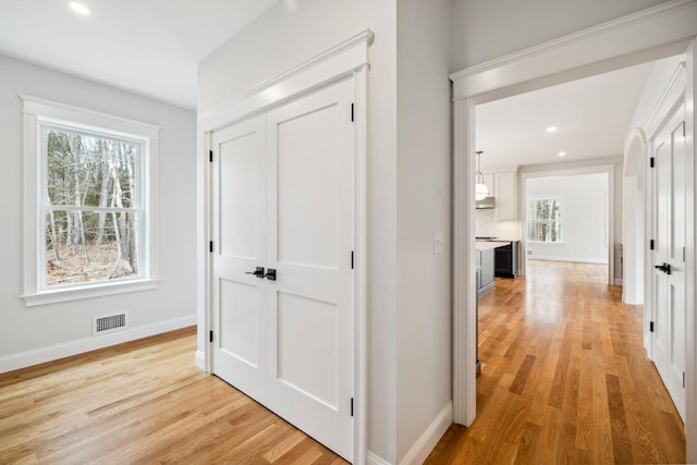 131 Exeter Rd, North Hampton, NH 03862 - corridor featuring light wood finished floors and recessed lighting