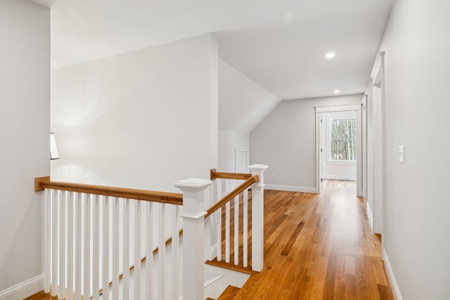131 Exeter Rd, North Hampton, NH 03862 - hall with an upstairs landing, wood finished floors, lofted ceiling, and recessed lighting